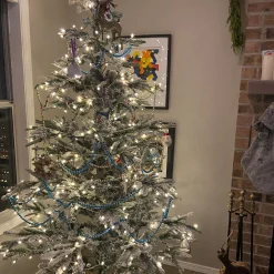 Northlight 7 And 7.5 Feet Tall>7.5' Pre-Lit Slim Nordmann Fir Flocked Artificial Christmas Tree - Warm Clear Led Lights